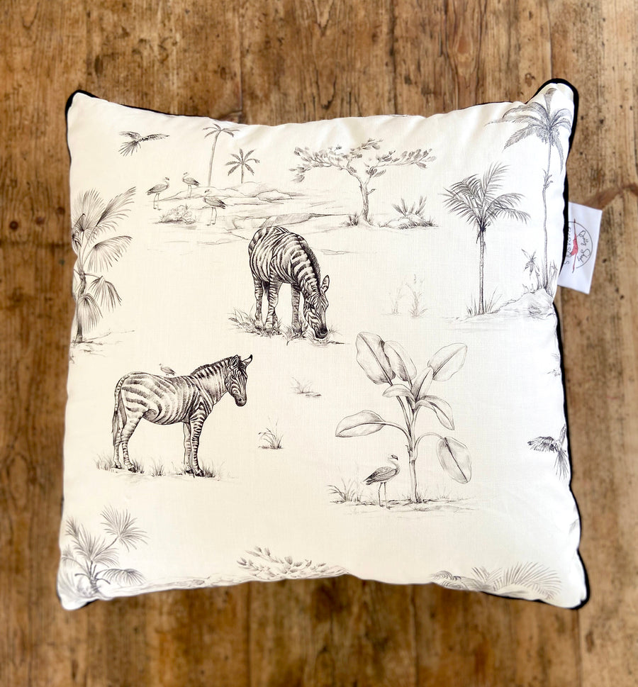 black and white giraffe and elephant print indoor cushion